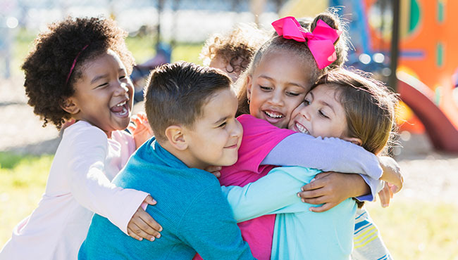 Kids hugging each other