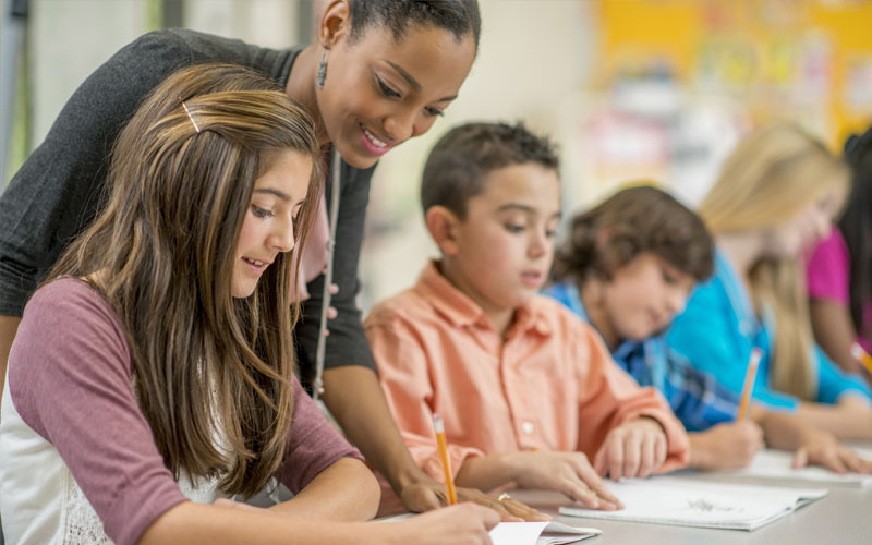 teacher with kids in classroom