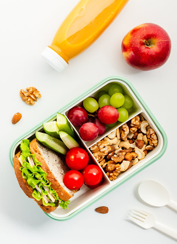 healthy sandwich with fruit and veggie sides