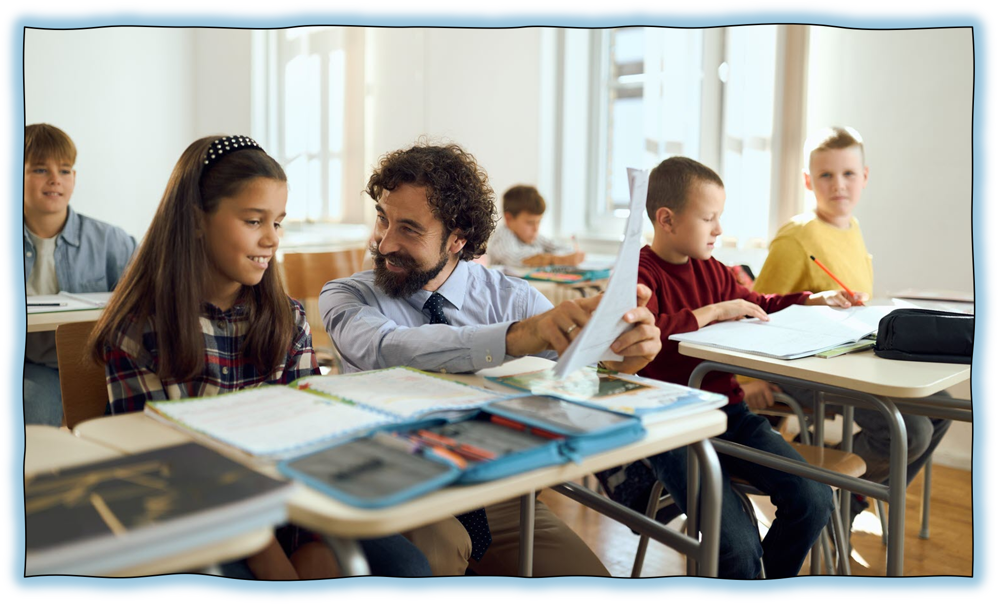 Practical Tools That Help Teachers Teach Photo image of teacher helping student in classrom