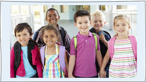 photos of elementary students walking together in a school hallway